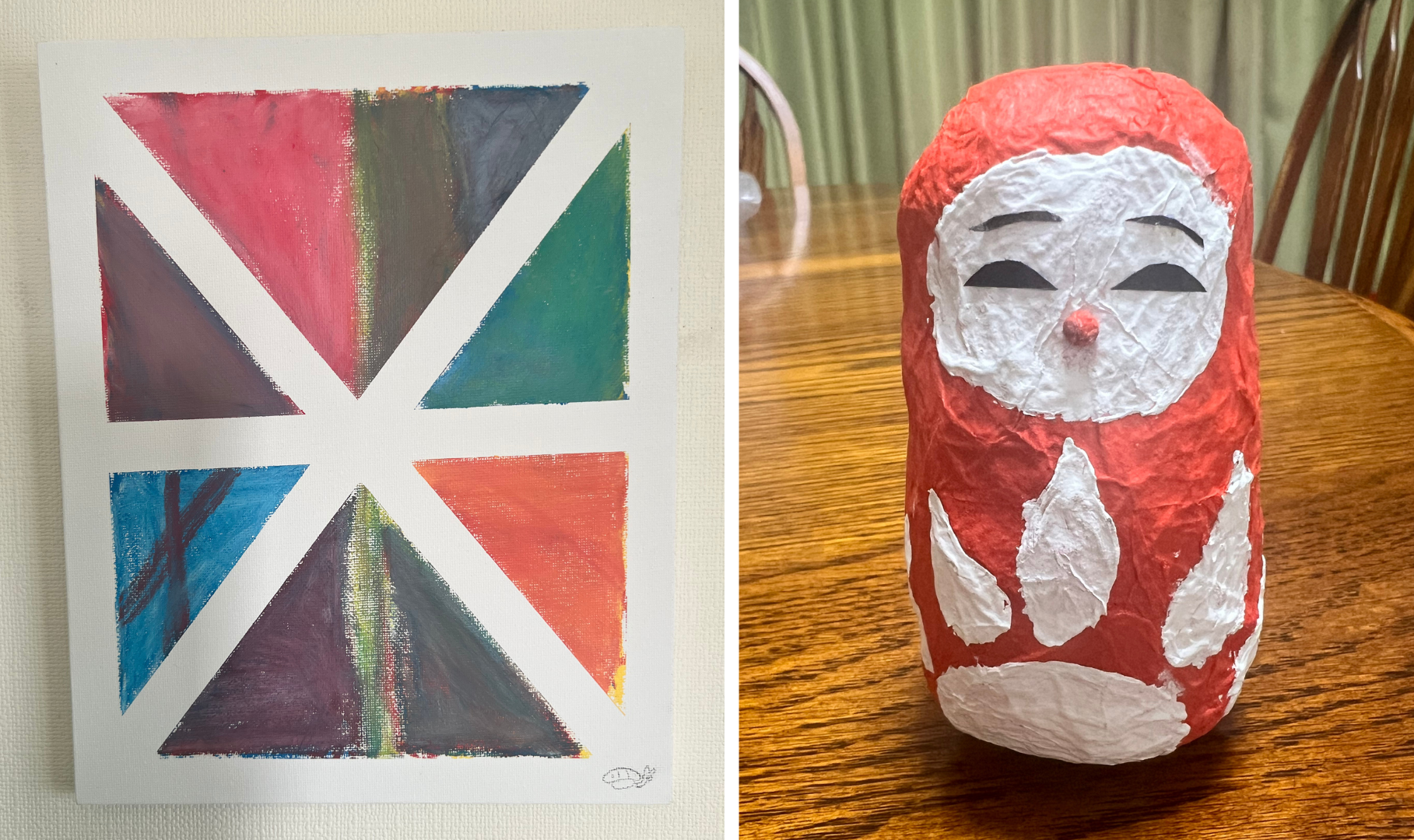 子どもたちがつくった絵とだるまの作品